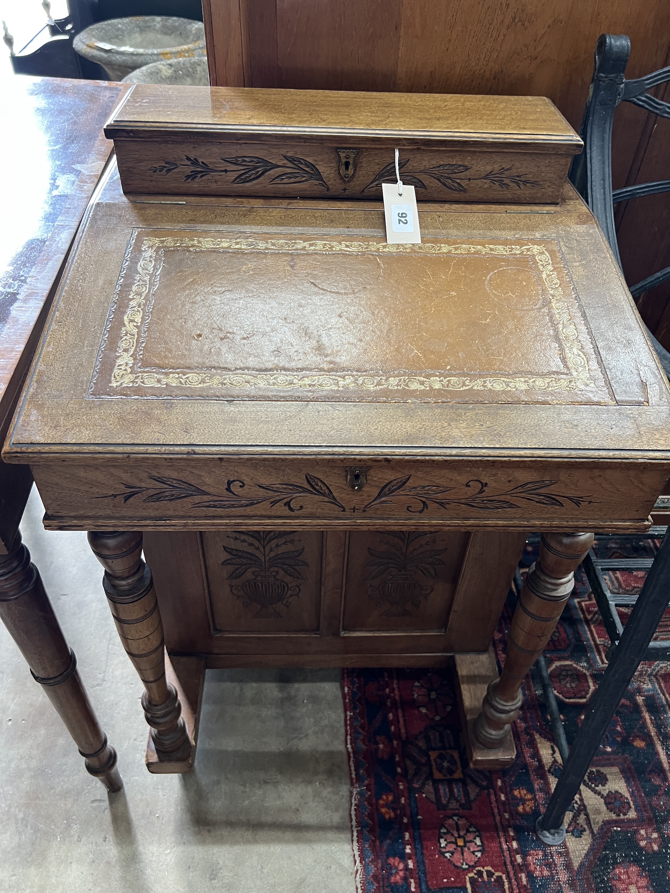 A late Victorian mahogany Davenport, width 56cm, depth 52cm, height 84cm